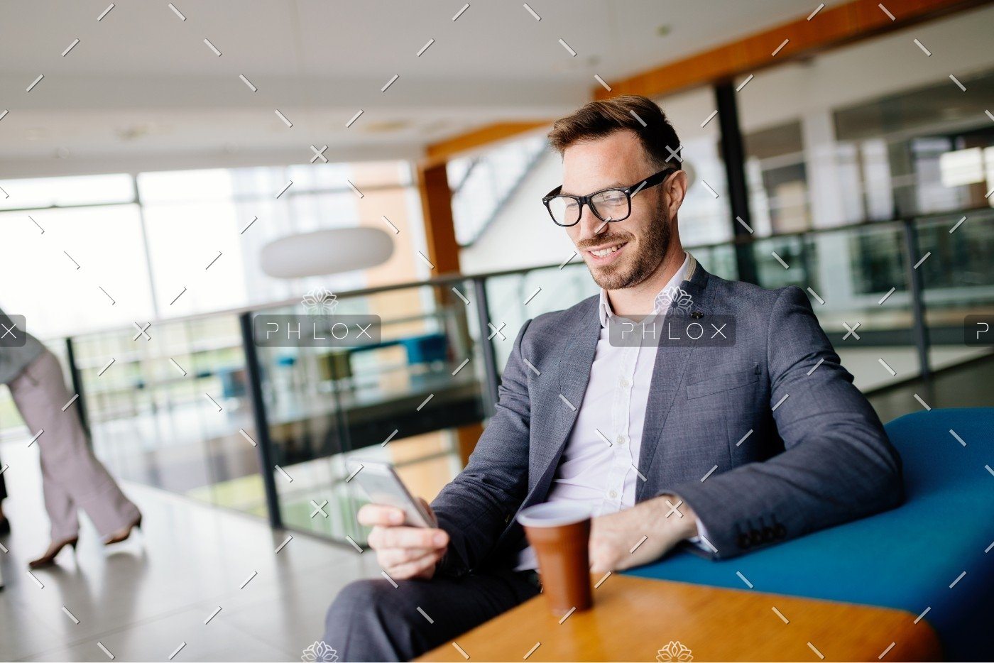 demo-attachment-657-businessman-taking-a-break-with-a-cup-of-coffee-JW4B3DH